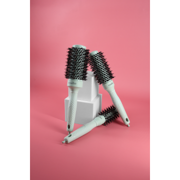 Brosse thermique pour brushing sur cheveux épais ou bouclés
