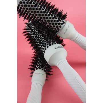 Brosse thermique pour brushing sur cheveux épais ou bouclés