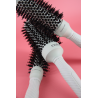 Brosse thermique pour brushing sur cheveux épais ou bouclés